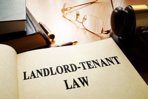 Landlord-Tenant law paperwork on table